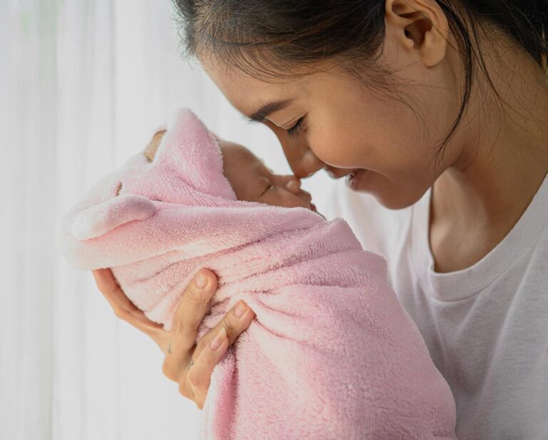 New born baby with mother