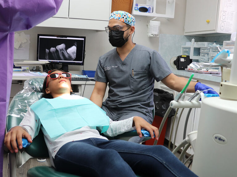 a little girl getting a dental check up