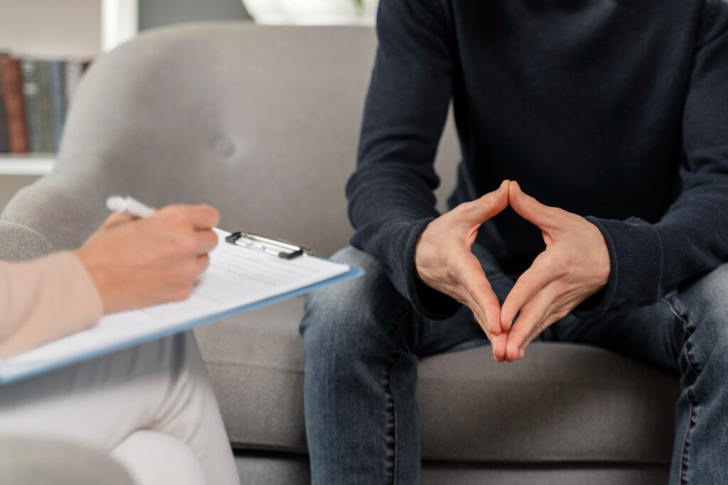 man talking to a therapist