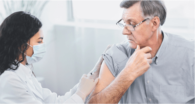 man getting vaccinated
