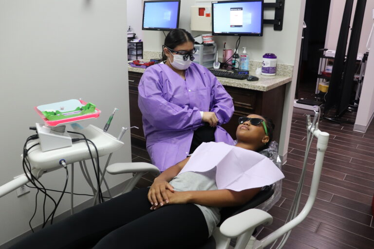 a young man getting a dental check up