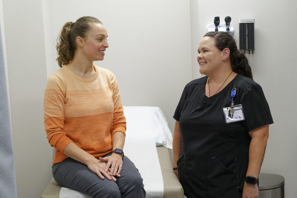 physician smiling to her patient
