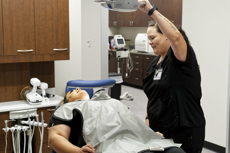 a woman getting a dental checkup