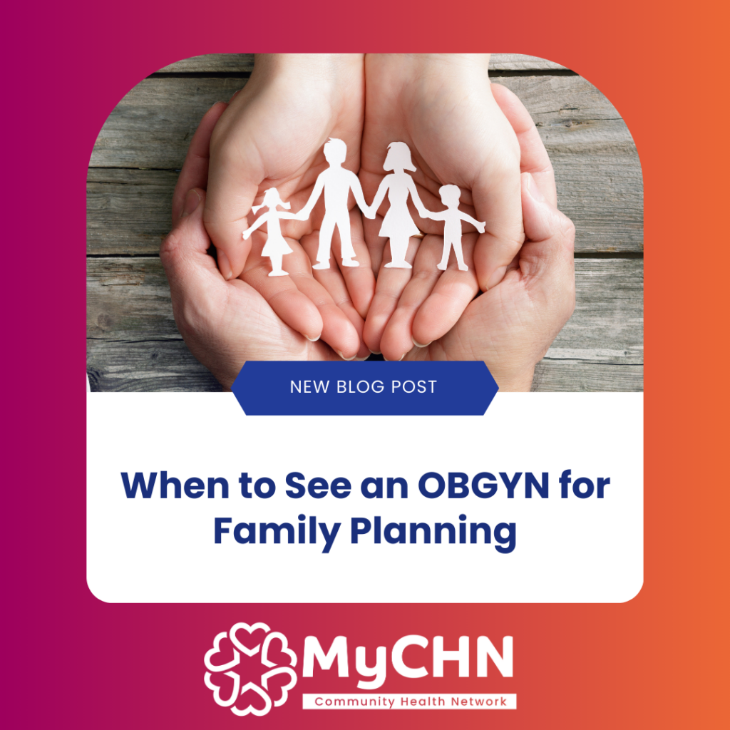 OBGYN is presenting family planning information to patient from tablet.